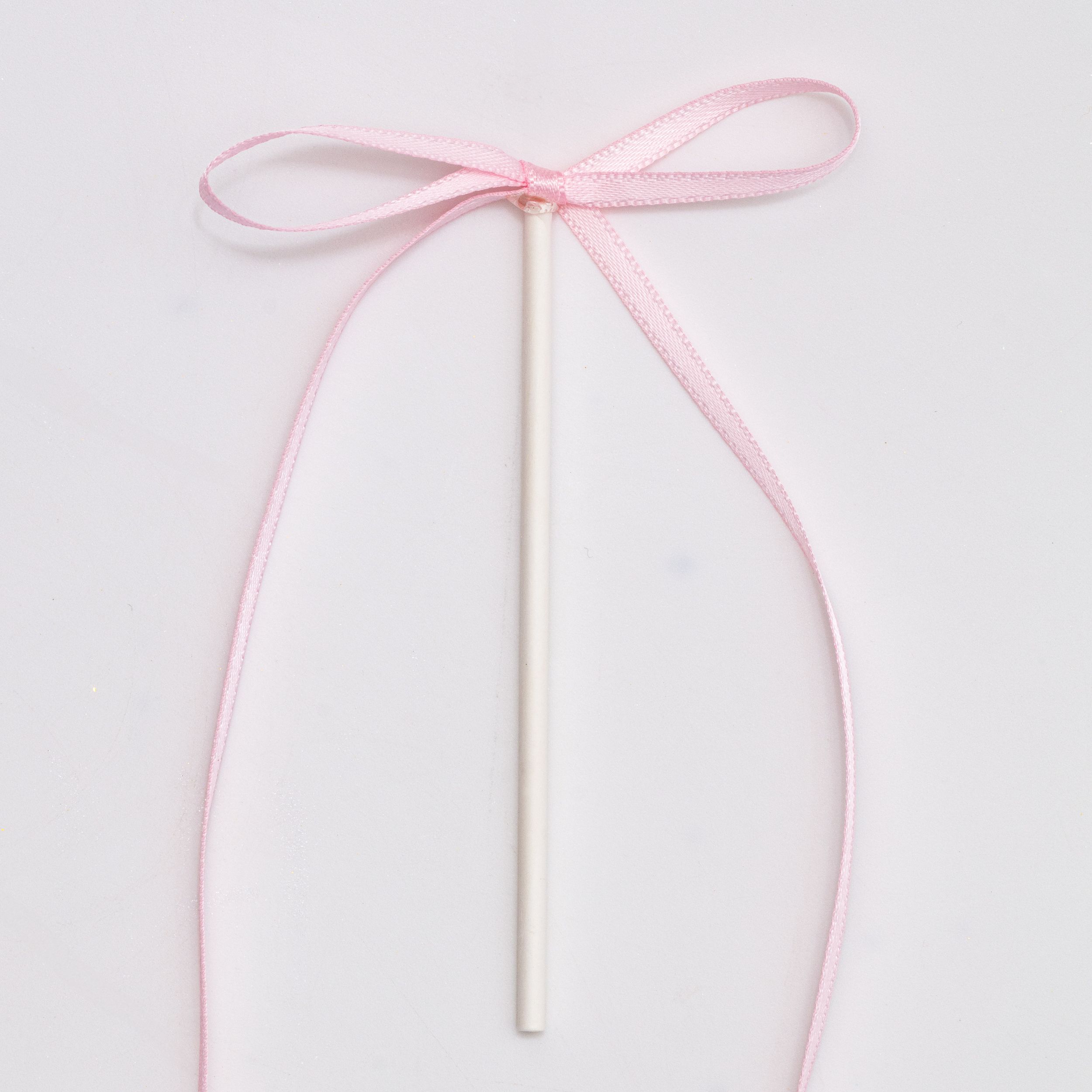 Rosa Schleifen Cupcake Topper von PME mit Satinoptik und Stäbchen