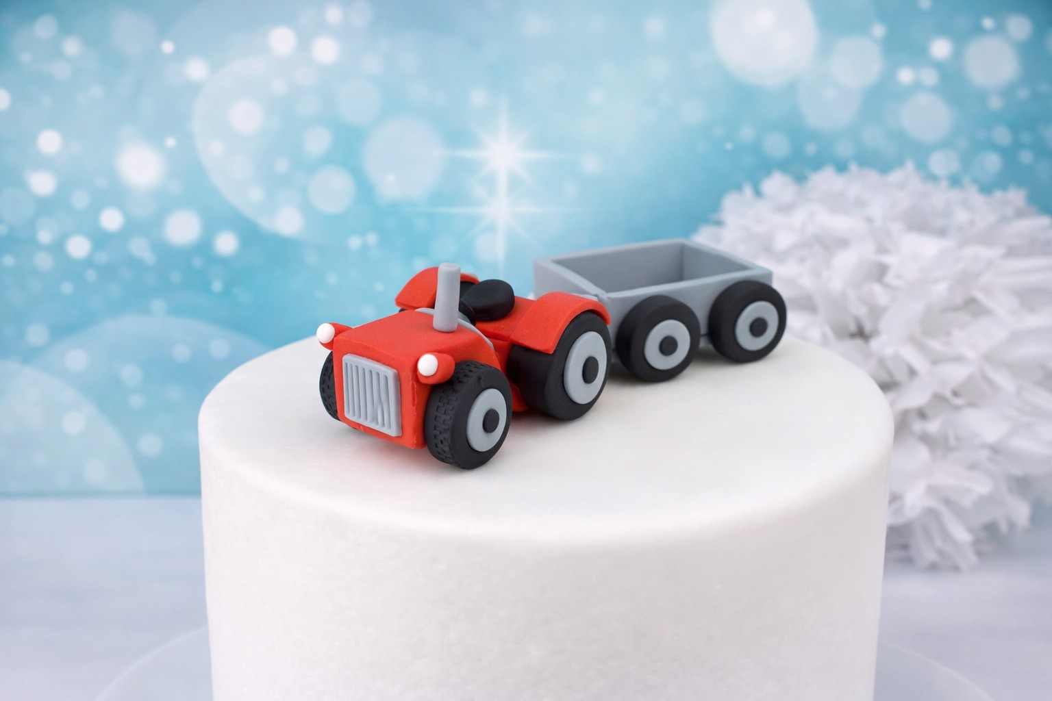 Tortenfigur Traktor mit Hänger 