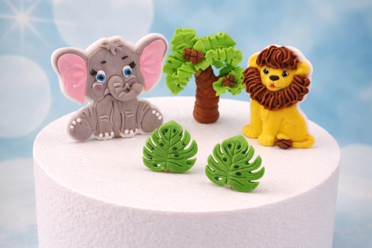 Tierische Tortendeko – Zuckerdekoration Elefant & Löwe