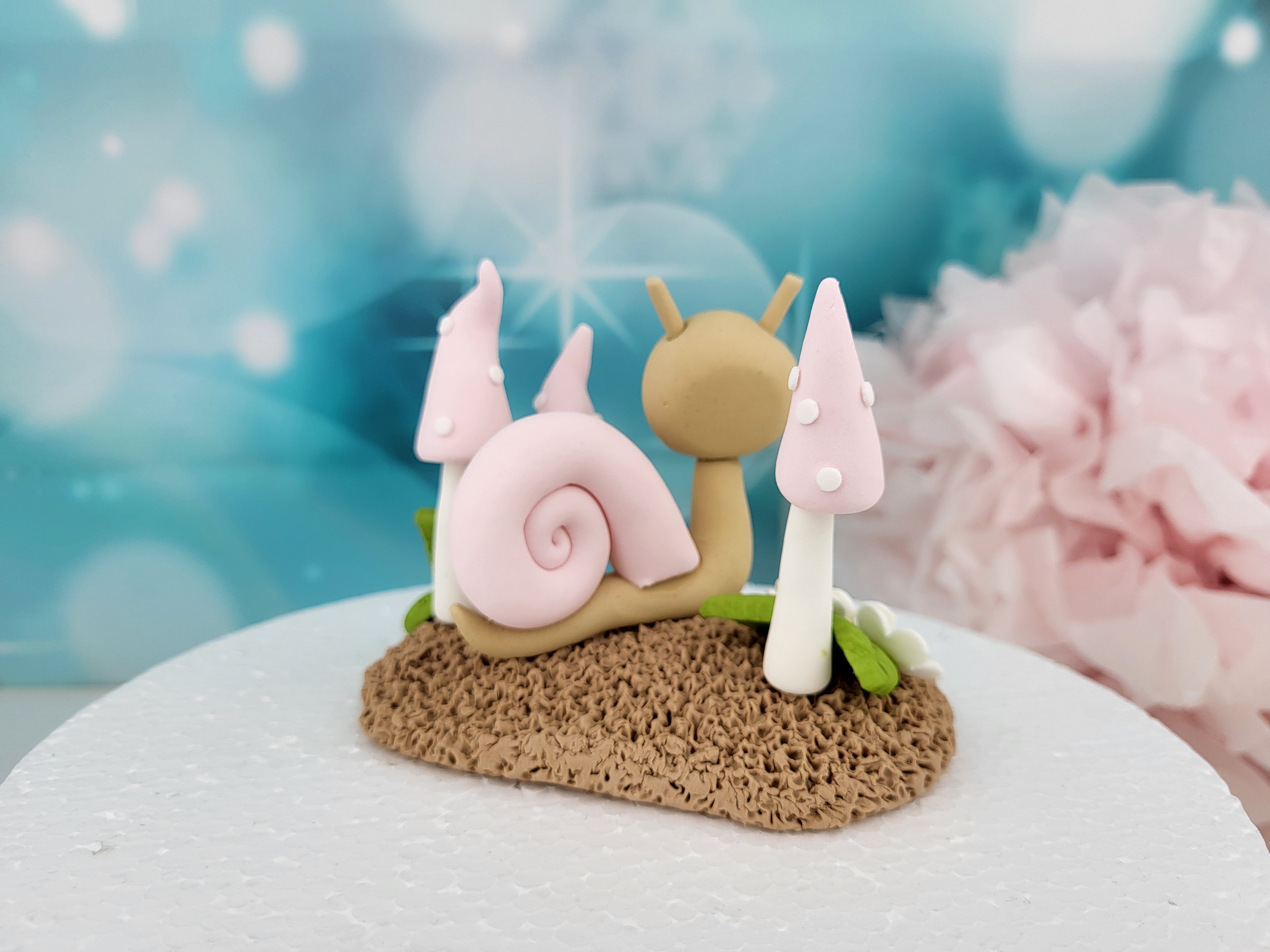 Tortenfigur „Schnecke mit Waldpilzen“